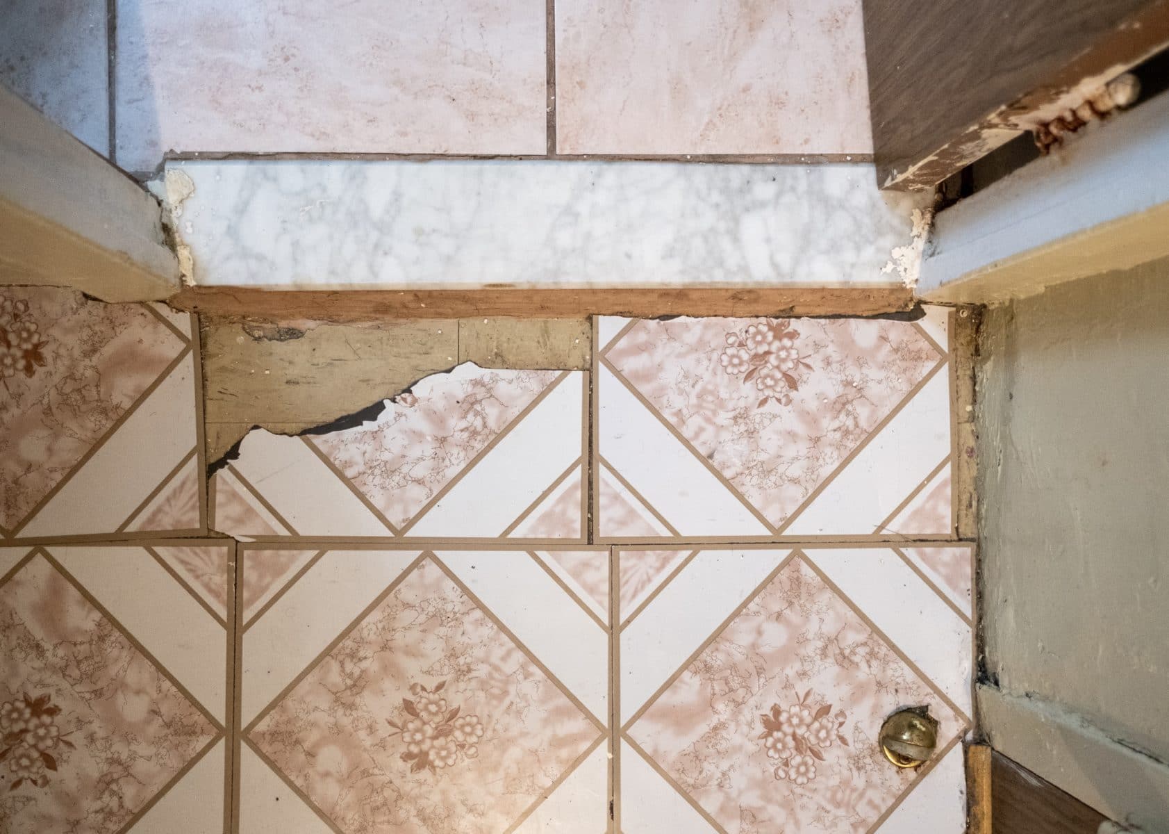 Hole in the floor of an apartment in the Polo Grounds Houses. Photo by Antonio Di Caterina.