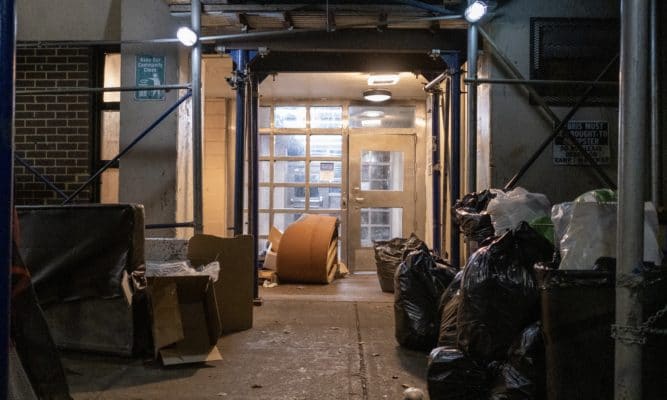 Garbage in the entry way. Polo Grounds Houses, Manhattan. Photo by Antonio Di Caterina