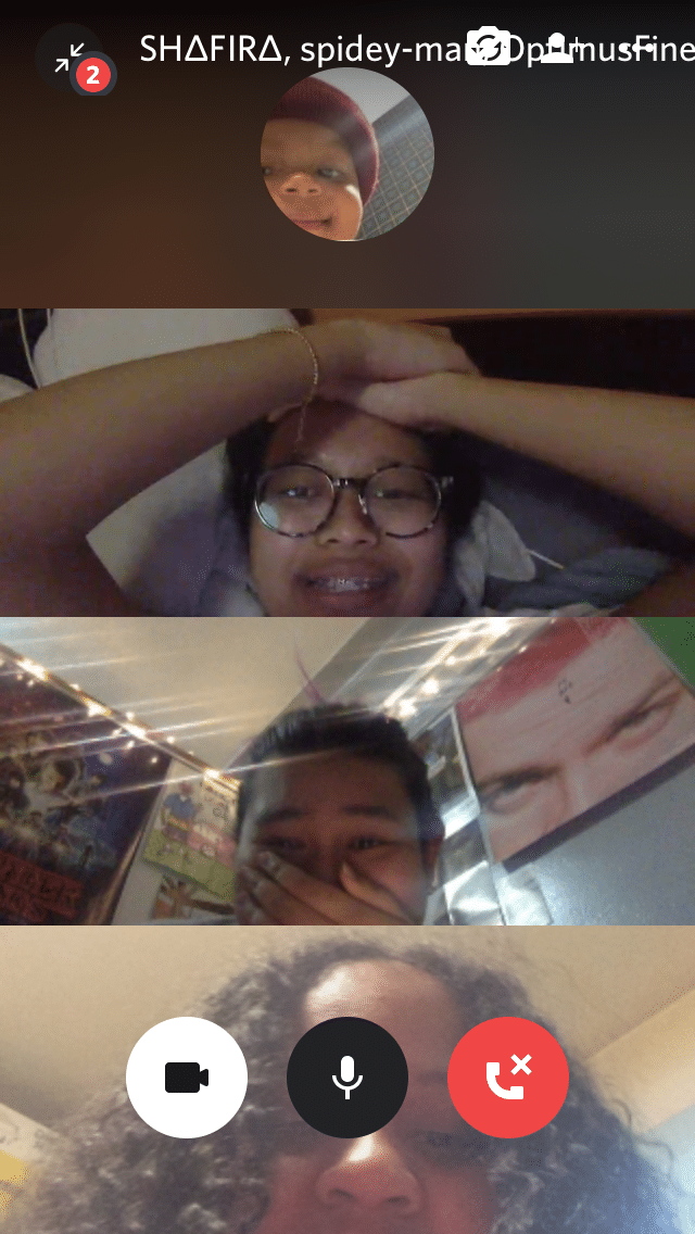 Four students on a group FaceTime call