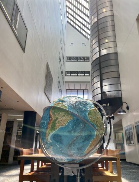 Large world globe in the center of the Cohen Library.