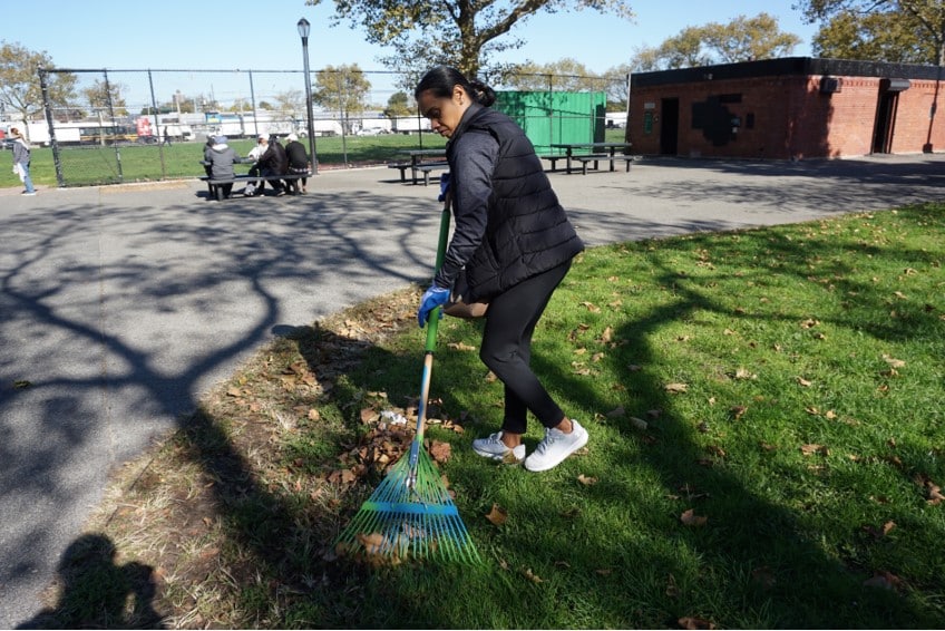Raking in Smokey Park in Richmond Hill, Queens