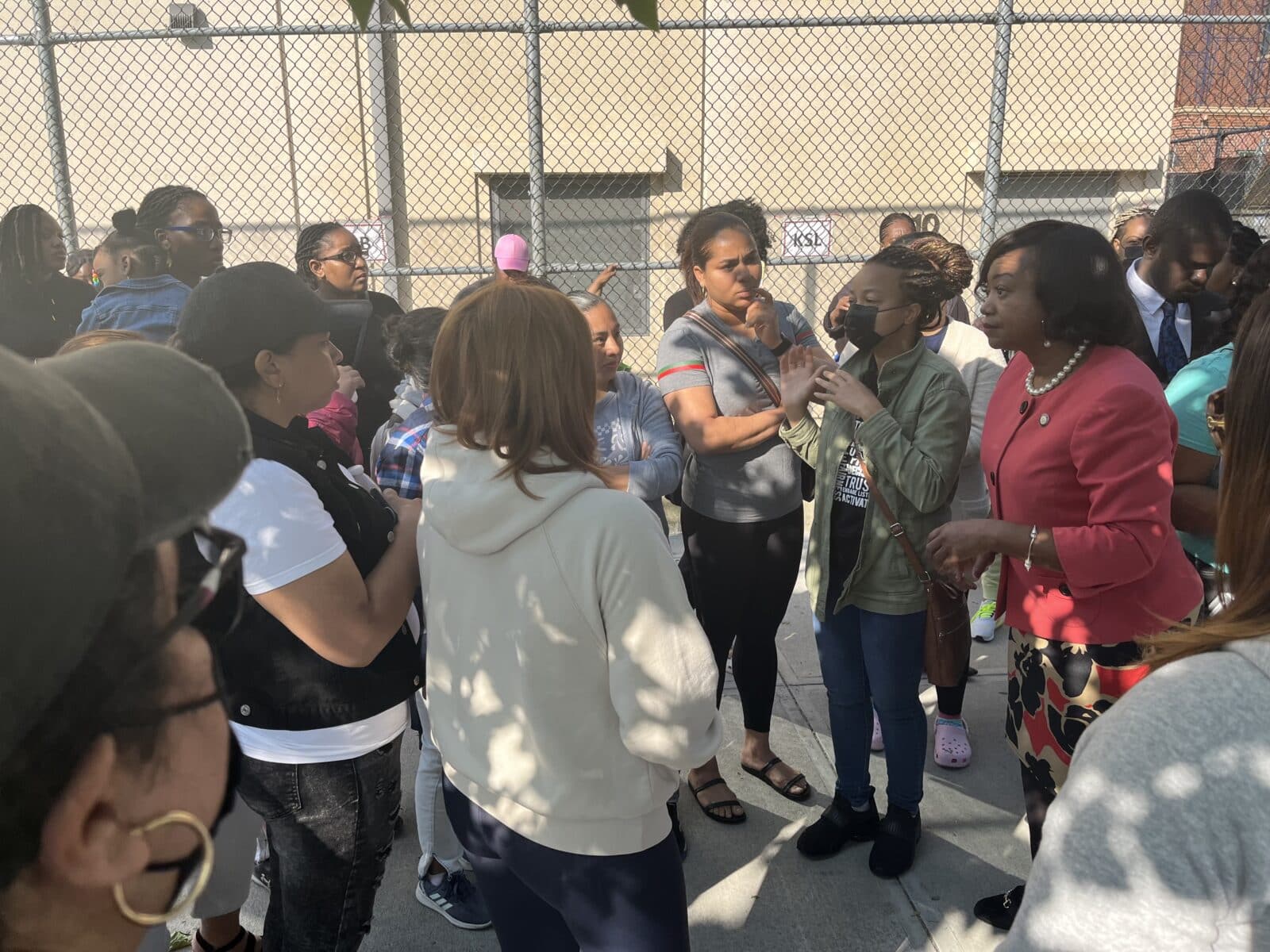 Councilwoman Darlene Mealy speaks to parents.
