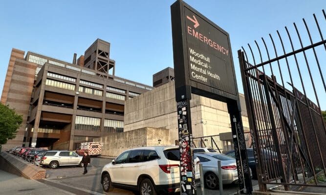 An emergency room sign outside NYC Health + Hospitals/Woodhull Hospital