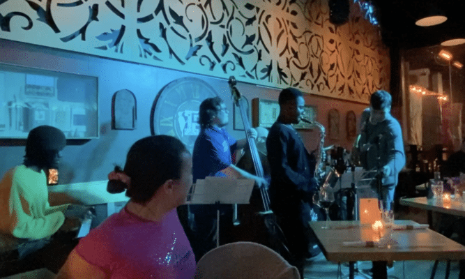 Inside a bar called The Porch in Harlem